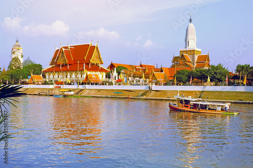 Phutthaisawan temple at day time with reflection on river Ayudthaya Thailand photo