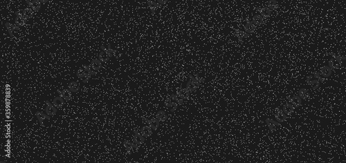 Abstract white dotted pattern grunge on black background and texture. Surface with fine fibers, particles and dust. Small noise, chaotic dots, spots