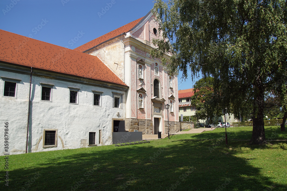 Dominican monastery established in the 13th century by the Dominican Order next to the Drava river and a castle in Ptuj. Slovenia. September 10, 2019:   