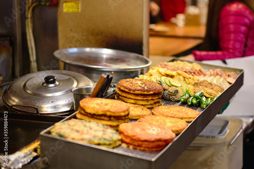 Kimchi fritters, punkcake on street. Korean street food
