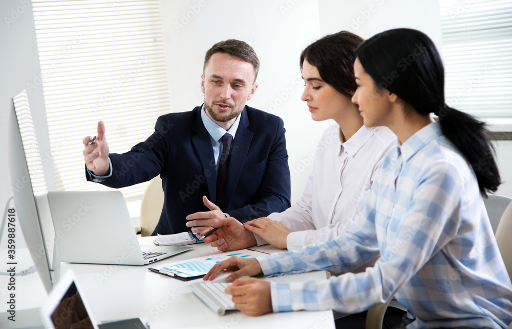 Business people working together in the office Business people working together in the office