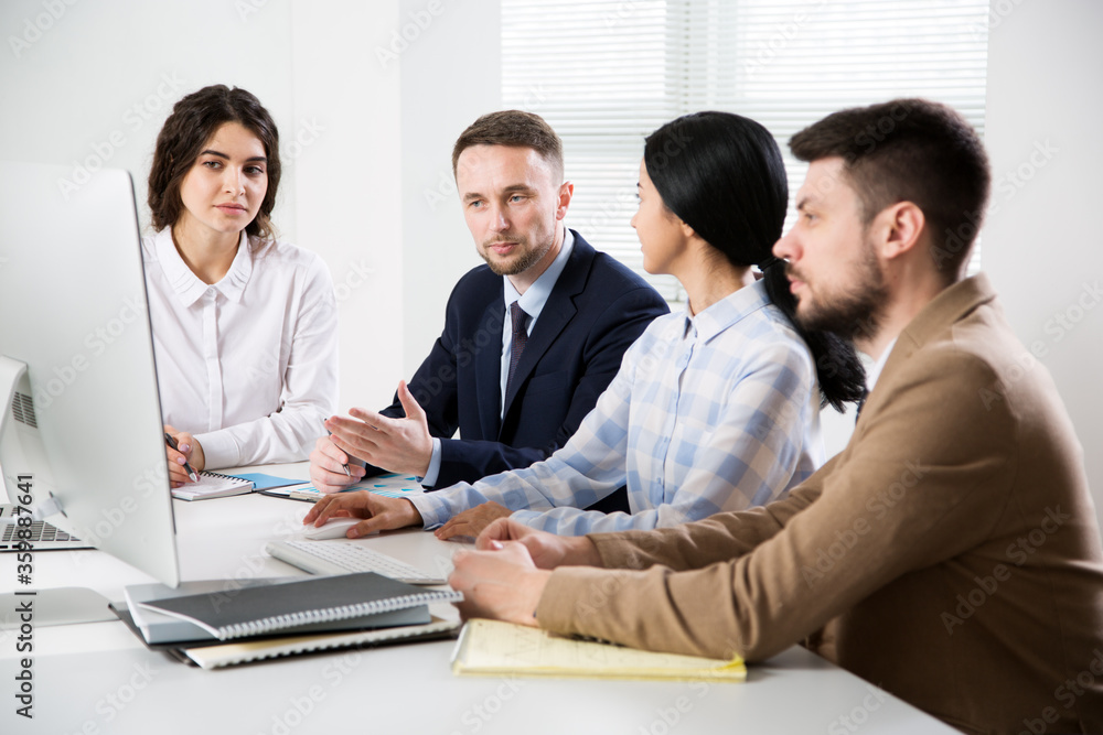 Business people working together in the office Business people working together in the office