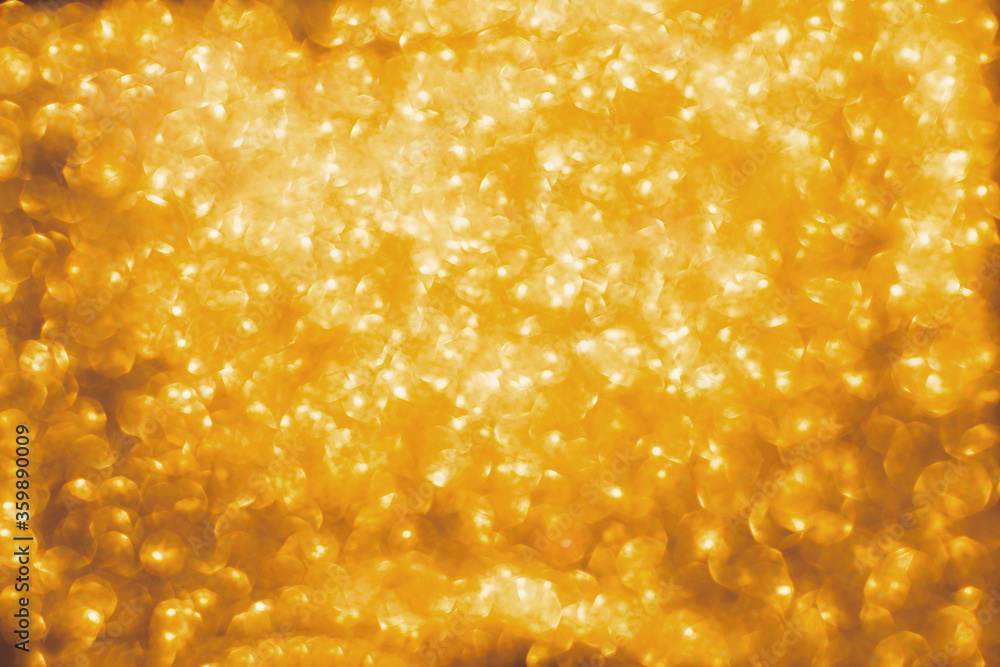 Abstract blurred gold sparkle bakground. Abstract blurred gold sparkle bakground.
