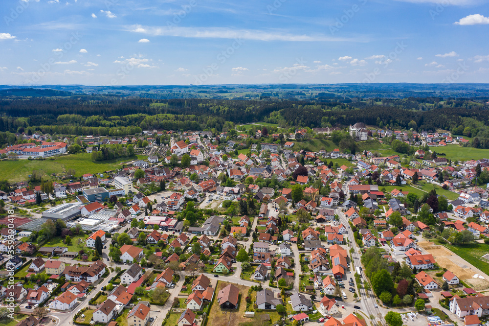 Aerial view of the city Bad Grönenbach in Germany, Bavaria on a sunny spring day during the coronavirus lockdown.

