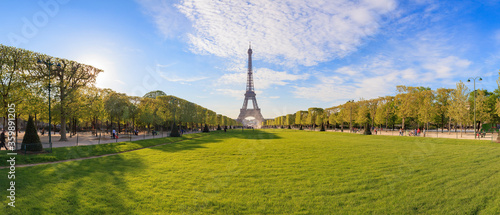 Panorama of the Champ de Mars park in Paris overlooking the Eiffel Tower photographed in the evening light in September 2016