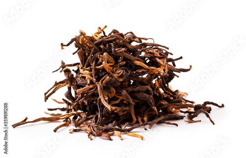 Chinese red tea jin jun mei  isolated on a white background.