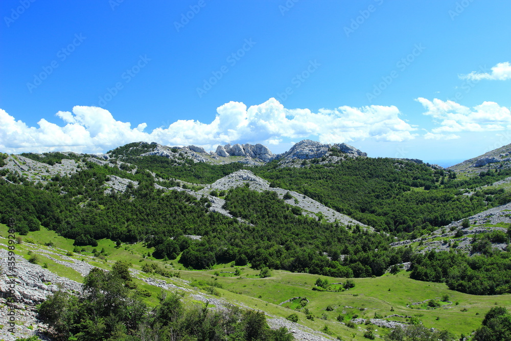 Mountain peaks on Velebit in Croatia, view from Mali Alan saddle to Tulove grede