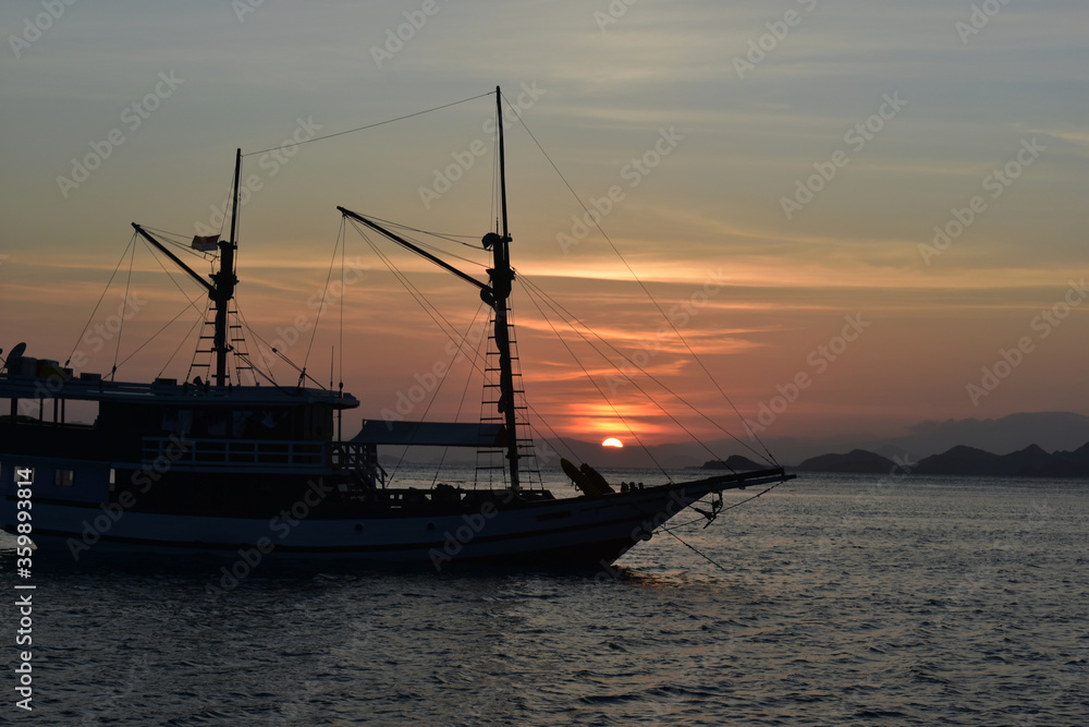 Fishing boat at sunset, Komodo Island, Labuan Bajo, East Nusa Tenggara, Indonesia