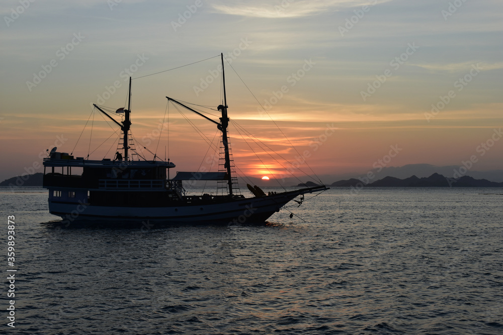 Fishing boat at sunset, Komodo Island, Labuan Bajo, East Nusa Tenggara, Indonesia