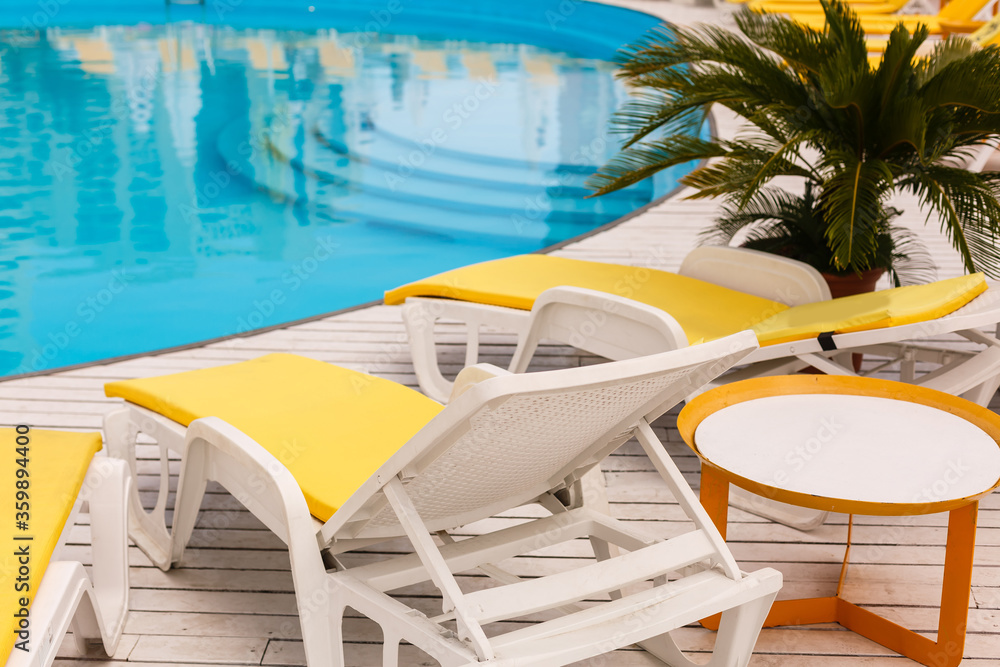Obraz premium Swimming pool with stair at hotel close up