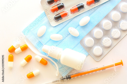 packaging for drugs: painkillers, antibiotics, vitamins and aspirin tablets. Set of white blisters with pills and capsules.