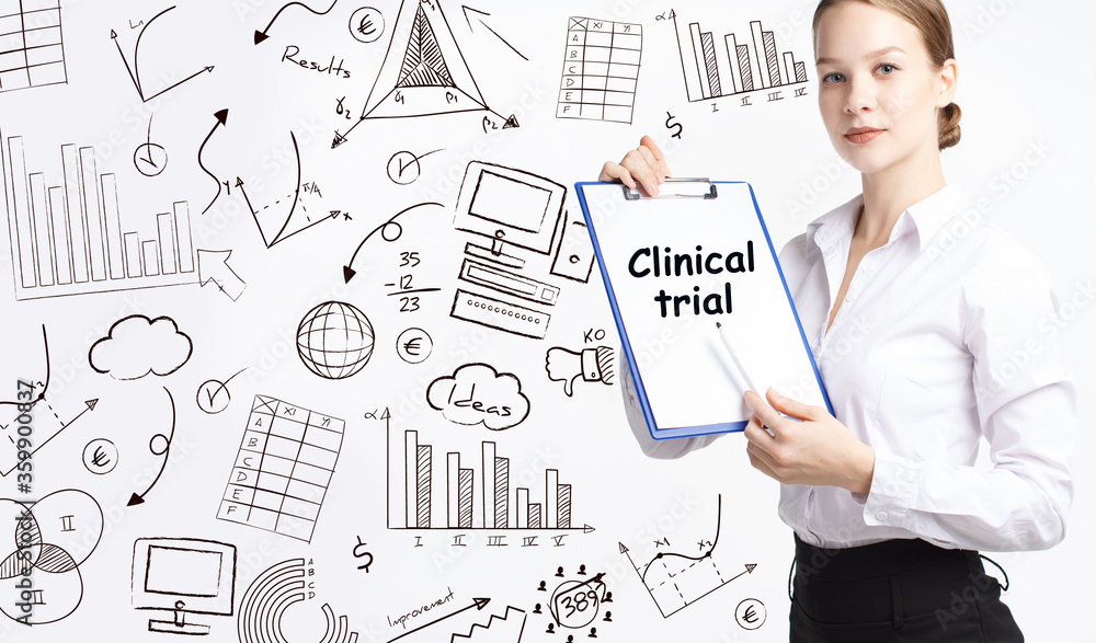 Business, technology, internet and network concept. Young businessman thinks over the steps for successful growth: Clinical trial Business, technology, internet and network concept. Young businessman thinks over the steps for successful growth: Clinical trial