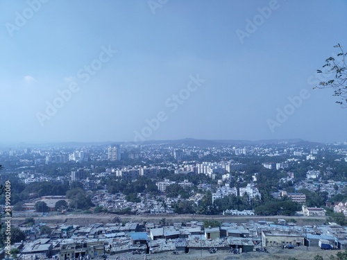 Indian Slum Area And City Separated By One Road In One Image