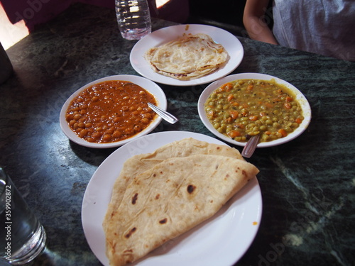 Curry, Chapati and Parotta, the local cuisine of South India, Alleppey (Alappuzha), Kerala, India