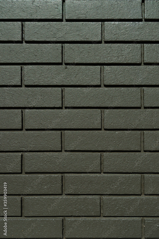 Obraz premium モスグリーン色のレンガ壁