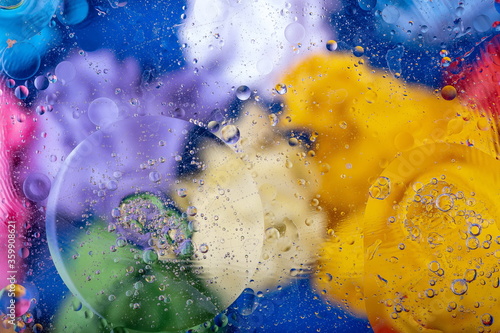 Wallpaper Mural Macro background. Oil drops on water with colorful glass Torontodigital.ca