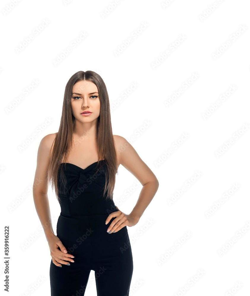 slender girl in overalls. Sports girl in tight clothes. Athletic brunette on a white background slender girl in overalls. Sports girl in tight clothes. Athletic brunette on a white background