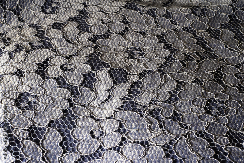 Fototapeta premium Blue lace texture. Lace background. Romantic fabric.