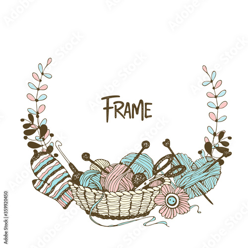 A wreath frame on the theme of knitting with a basket with yarn and mittens. Vector