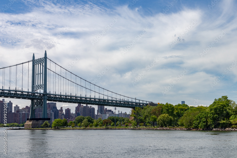 The Triborough Bridge connecting Astoria Queens New York to Wards and Randall's Island over the East River during Spring