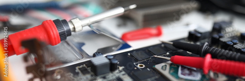 Photography Close up on an electronic device are repair tools