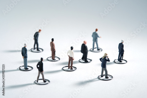 Принти на полотні The new normal, people go to work maintaining physical distance in the crowd