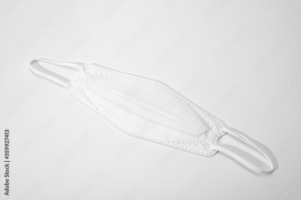 Fototapeta premium The white protective mask is tiled