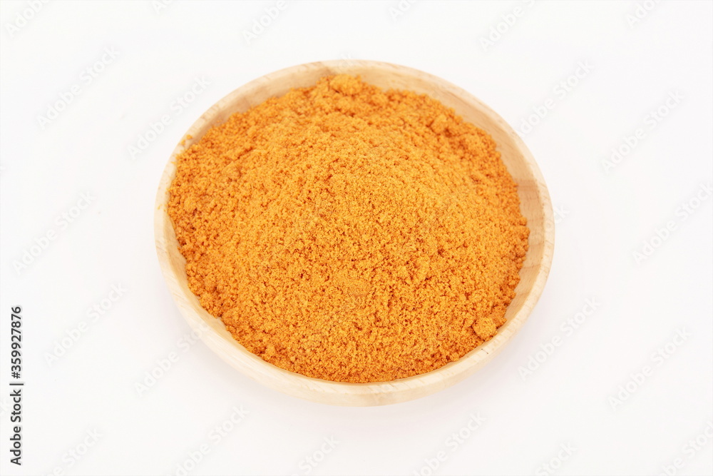 Marinated chicken seasoning in a wooden bowl Marinated chicken seasoning in a wooden bowl