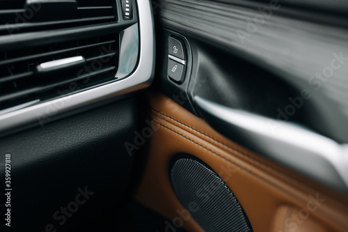 Car doors lock buttons close up © Moose