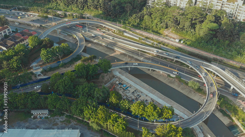 Aerial shot, view from the drone on the road junction of Kuala-Lumpur, Malaysia.