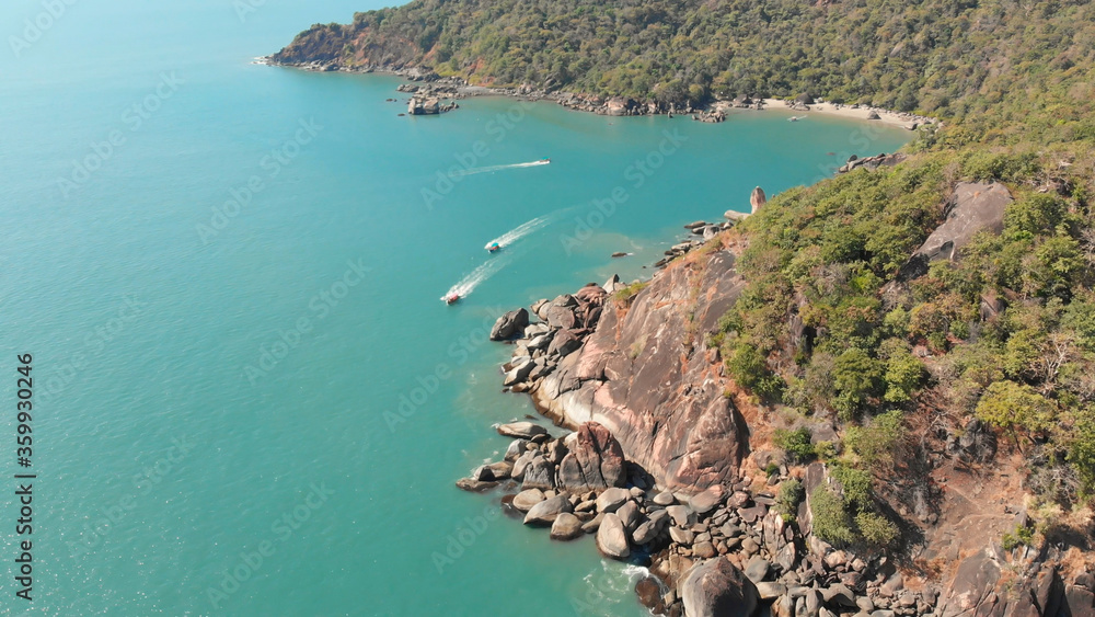 Rocky hills near Butterfly Beach. Goa India. Drone video.