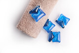 Detergent washing pods and clean bath towel