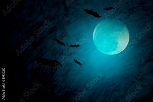 Full moon with blue Halloween night background
