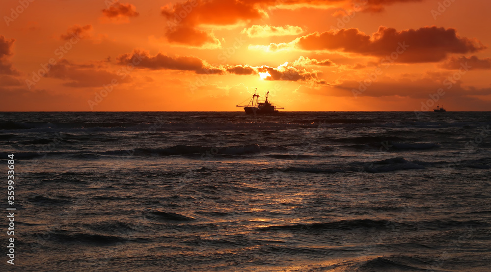 fishing boat in the sunset fishing boat in the sunset