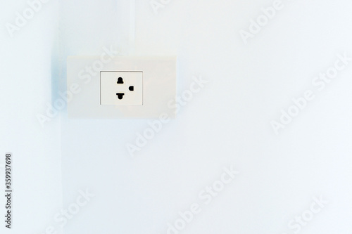 Outlet install on wall in new house with copy space