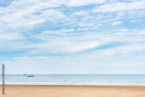 Summer seascape with blue sky background