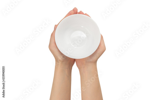 White bowl in woman hand isolated on white.