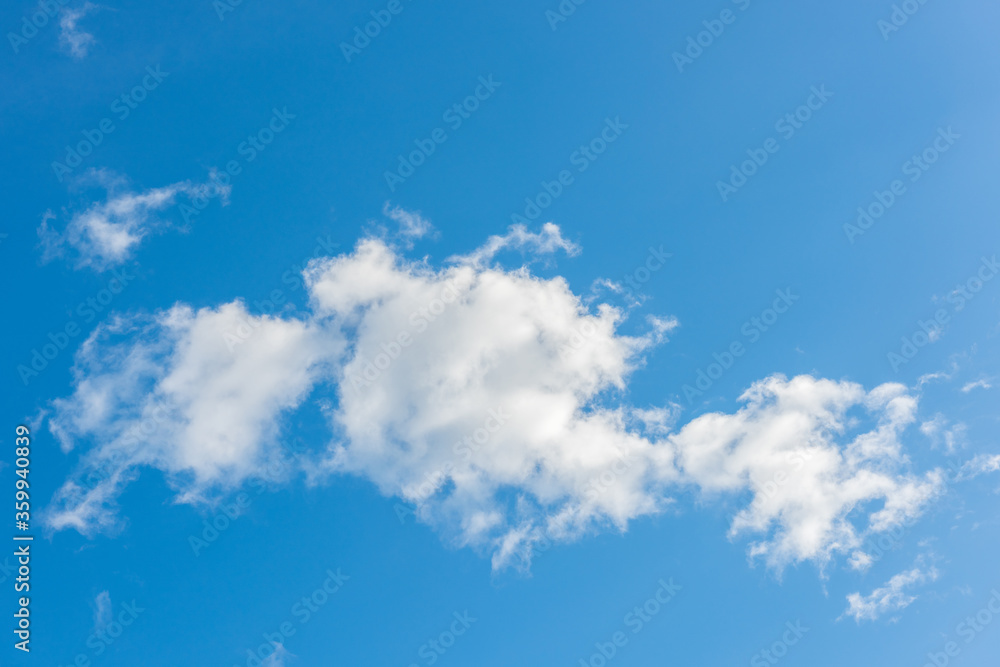 Beautiful cirrus clouds against the blue sky Beautiful cirrus clouds against the blue sky