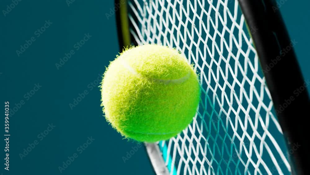 Slow-motion animation of the tennis racket striking the ball. A ball hit. 4  K HD Stock Video | Adobe Stock