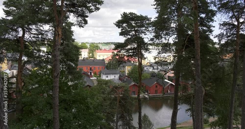 4K high quality video footage of forest above medieval Porvoo old town on river Porvoonjoki, area 50 km east of Helsinki, capital of Finland in northern Europe photo