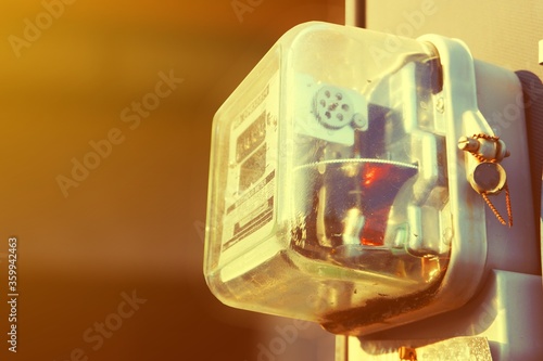 close up of electric meters with clear glass cover