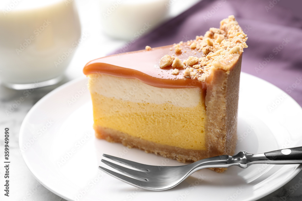 Piece of delicious cake with caramel on plate, closeup Piece of delicious cake with caramel on plate, closeup