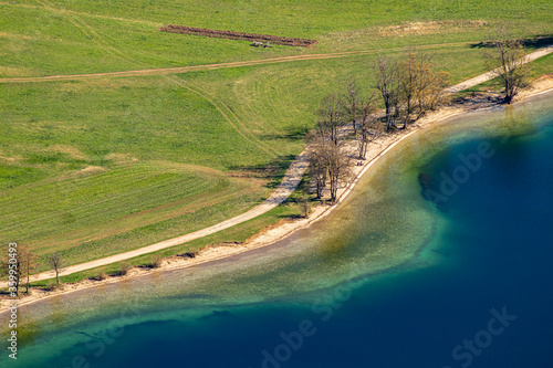 Hiking trail next to Bohinj lake in spring	 photo