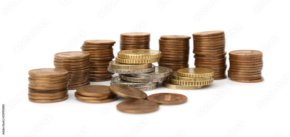Stacks of metal coins on white background Stacks of metal coins on white background