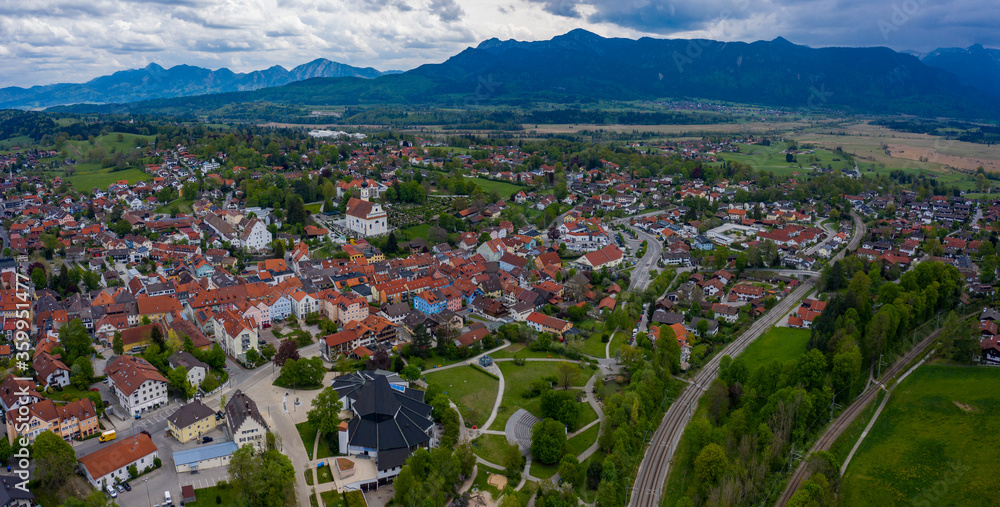 Aerial view of the city and monastery Andechs in Germany, Bavaria on a sunny spring day during the coronavirus lockdown.
