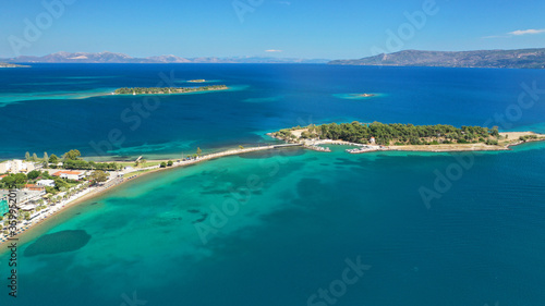 Aerial drone photo of tropical Caribbean bay with white sand beach and beautiful turquoise and sapphire clear sea © aerial-drone