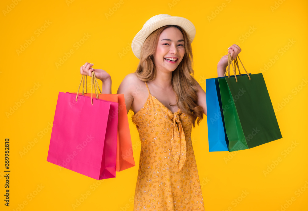 Asian woman shopping sessions at a discounted price. She paid the same amount but received more items. Mid year sales or New Year sales Is when the product price will the most discounted.