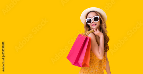 Asian woman shopping sessions at a discounted price. She paid the same amount but received more items. Mid year sales or New Year sales Is when the product price will the most discounted.