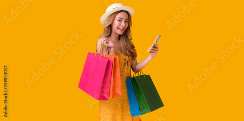 Asian woman shopping sessions at a discounted price. on mid year sales or New Year sales the product price the most discounted from 50% up to 80%