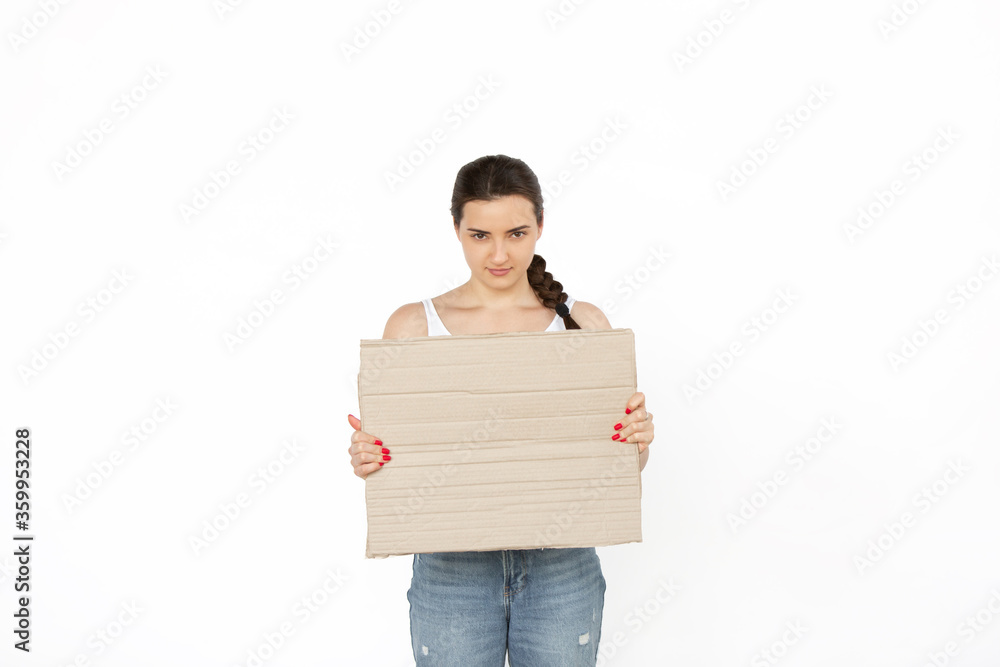 Young woman protesting with blank board, sign isolated on white studio background. Activism, active social position, protest, actual problems. Meeting against human rights, abusing, freedom of choice. Young woman protesting with blank board, sign isolated on white studio background. Activism, active social position, protest, actual problems. Meeting against human rights, abusing, freedom of choice.
